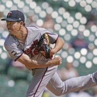 Twins starter Kenta Maeda pitches against the Tigers in Detroit on Wednesday. | AP / VIA KYODO