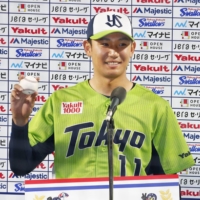 Yasunobu Okugawa speaks during his hero interview after the Swallows' win over the Carp on Wednesday at Jingu Stadium. | KYODO