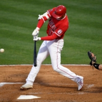 The Angels' Shohei Ohtani connects on a two-run home run against the Rays during the third inning in Anaheim, California, on Thursday. | USA TODAY / VIA REUTERS