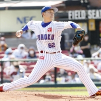 Rookie Eagles reliever Naoto Nishiguchi pitches against the Hawks on Saturday in Sendai. | KYODO