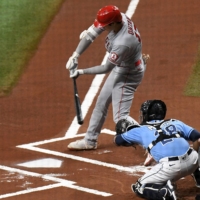 Los Angeles Angels designated hitter Shohei Ohtani hits a solo home run in the first inning against the Tampa Bay Rays at Tropicana Field. | USA TODAY / VIA REUTERS