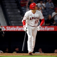 Los Angeles Angels designated hitter Shohei Ohtani hits a solo home run during the eighth inning against the Detroit Tigers at Angel Stadium. | USA TODAY SPORTS / VIA REUTERS