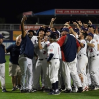 Team USA players celebrate after defeating Venezuela to qualify for the Tokyo Olympics on Saturday in Port St. Lucie, Florida. | USA TODAY / VIA REUTERS