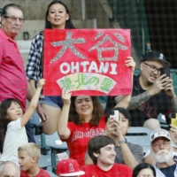 Shohei Ohtani's historic first half of the season has made him a fan favorite in Anaheim, California, and put him on pace to become just the fifth MLB player since Babe Ruth to cross the 60-homer threshold. | KYODO