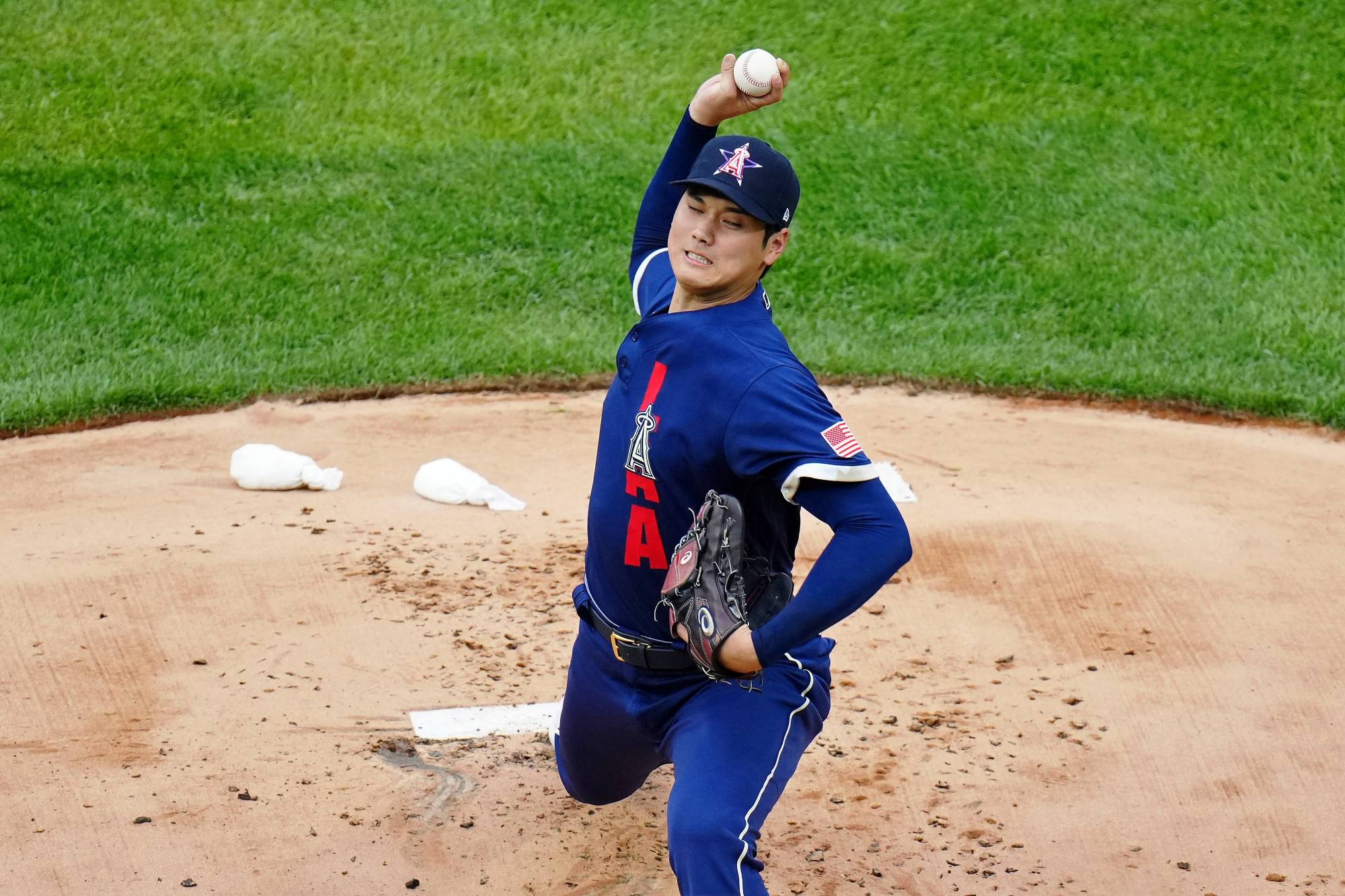 Shohei Ohtani of the Los Angeles Angels pitches against the National League during the first inning of the MLB All-Star Game at Coors Field in Denver on Tuesday. | USA TODAY / VIA REUTERS