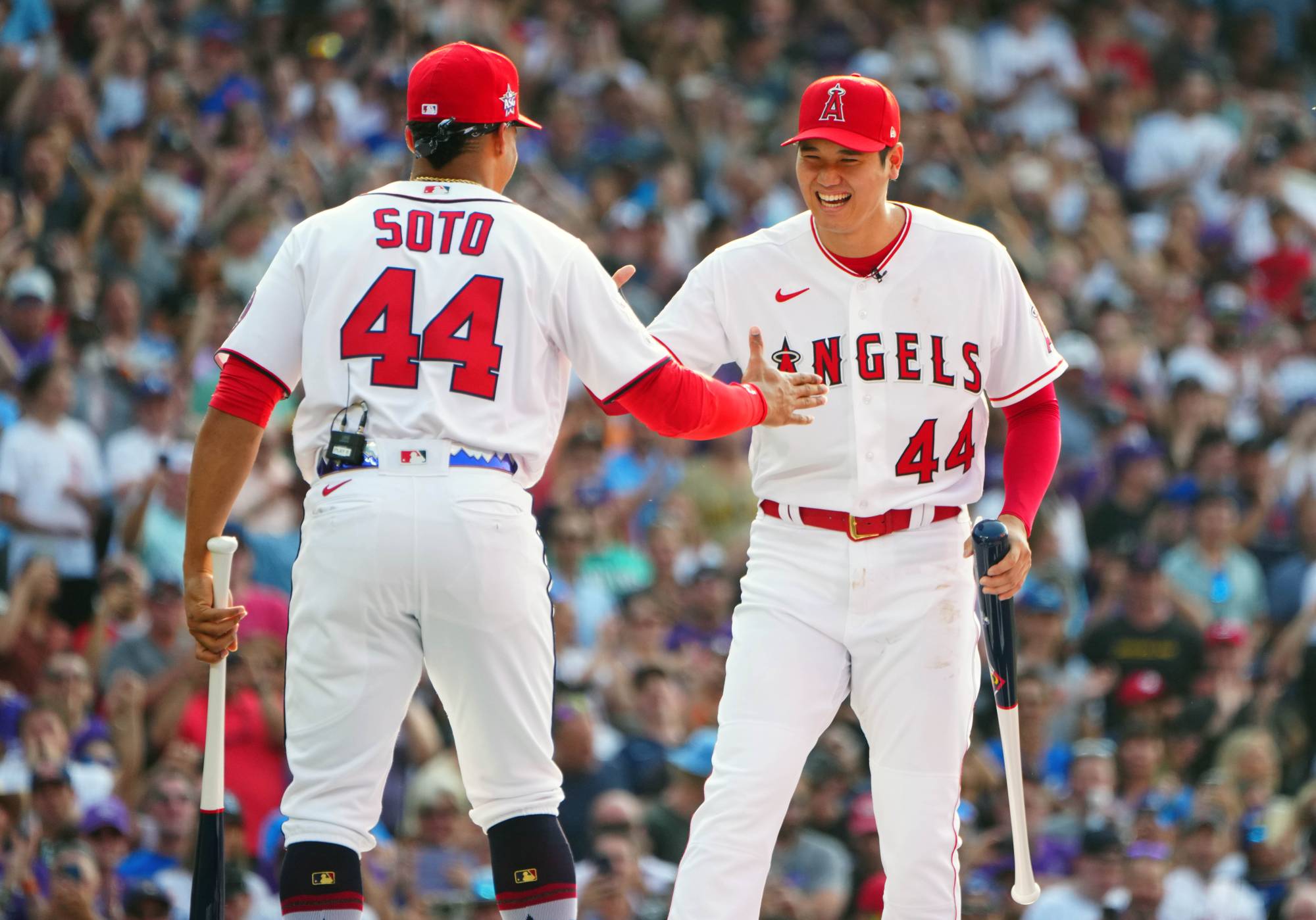 Nationals right fielder Juan Soto greets Shohei Ohtani during introductions at the Home Run Derby on Monday. | USA TODAY / VIA REUTERS