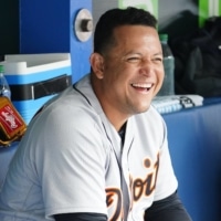 Miguel Cabrera laughs in the dugout after hitting a solo home run, the 500th of his career, during the Tigers' game against the Blue Jays on Sunday. | USA TODAY / VIA REUTERS