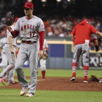 Los Angeles Angels starting pitcher Shohei Ohtani walks off the mound after a pitching change in the fourth inning against the Houston Astros on Friday. | USA TODAY / VIA REUTERS
