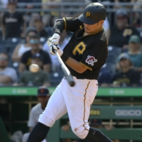 Pittsburgh Pirates first baseman Yoshitomo Tsutsugo hits a two run single against the Detroit Tigers during the seventh inning at PNC Park. | USA TODAY / VIA REUTERS