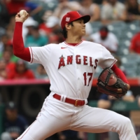 Angels starter Shohei Ohtani pitches against the Mariners at Angel Stadium in Anaheim, California, on Sunday. | USA TODAY / VIA REUTERS