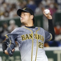 Tigers pitcher Haruto Takahashi threw the first shutout of his career on Saturday. | KYODO