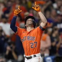 The Astros' Jose Altuve celebrates after his solo home run against the Braves during Game 2 of the World Series in Houston on Wednesday. | USA TODAY / VIA REUTERS