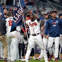 The Braves celebrate after advancing to the World Series with an NLCS Game 6 win over the Dodgers on Saturday in Cumberland, Georgia. | USA TODAY / VIA REUTERS