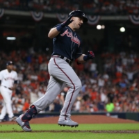 Braves center fielder Adam Duval rounds the bases after his two-run home run against the Astros during Game 1 of the 2021 World Series on Tuesday in Houston. | USA TODAY / VIA REUTERS