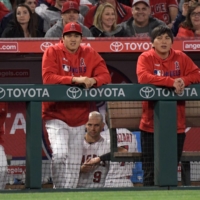 Interpreter Ippei Mizuhara (right) is among a number of supporting staffers who helped Shohei Ohtani accomplish his historic 2021 season. | USA TODAY / VIA REUTERS