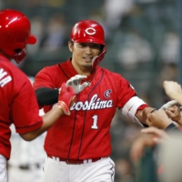 Suzuki's .370 batting average and 19 home runs since Sept. 1 have kept Hiroshima in the hunt for a postseason appearance. | KYODO