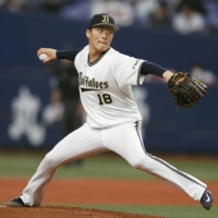 Yoshinobu Yamamoto pitches against the Marines during Game 1 of the Pacific League Climax Series Final Stage in Osaka on Wednesday. | KYODO
