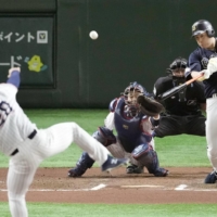 The Buffaloes' Yutaro Sugimoto hits a two-run home run in the sixth inning during Game 2 at Tokyo Dome. | KYODO