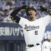 Yuma Mune celebrates after a home run against the Marines in Game 3 of the Pacific League Climax Series in Osaka on Nov. 12. | KYODO