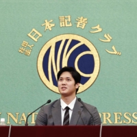 Angels star Shohei Ohtani speaks at the Japan National Press Club on Monday. | KYODO