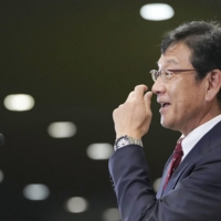 Outgoing Fighters manager Hideki Kuriyama speaks at a news conference in Sapporo on Monday. | KYODO