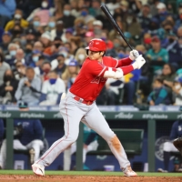 Shohei Ohtani bats against the Mariners during the fifth inning on Oct. 1. | USA TODAY / VIA REUTERS