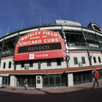 People walk past Wrigley Field in Chicago on Thursday. | USA TODAY / VIA REUTERS