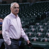MLB Commissioner Rob Manfred walks on the field before Game 1 of the ALDS in Houston on Oct. 7, 2021. | USA TODAY / VIA REUTERS