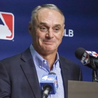 Commissioner of Major League Baseball Rob Manfred announces that it has agreed to a new labor-management agreement with the MLB Players Association on Thursday. | AP / VIA KYODO