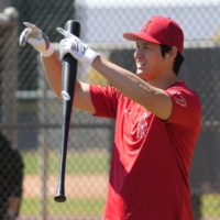 Angels two-way player Shohei Ohtani takes batting practice at the team's training camp facility in Tempe, Arizona, on Monday. | USA TODAY / VIA REUTERS