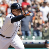 Detroit Tigers designated hitter Miguel Cabrera celebrates as he hits a single for his 3,000th career hit on Sunday at Comerica Park. | USA TODAY / VIA REUTERS