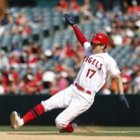 Shohei Ohtani slides into second during the seventh inning of the Angels' win over the Orioles. | KYODO