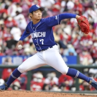 Chunichi Dragons outfielder Akira Neo makes his NPB pitching debut against the Carp in Hiroshima on Saturday. | KYODO