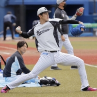 Marines pitcher Roki Sasaki trains at Chiba's Zozo Marine Stadium on Monday. | KYODO