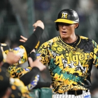 Yoshio Itoi has nine hits and five RBIs during the Tigers' six-game winning streak. | KYODO