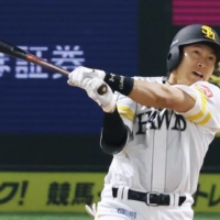 SoftBank's Yuki Yanagita homers in the seventh inning against the Buffaloes in Fukuoka on Wednesday. | KYODO