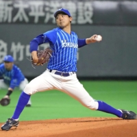BayStars pitcher Shota Imanaga throws a pitch on his way to a no-hitter against the Nippon Ham Fighters in an interleague baseball game at Sapporo Dome on Tuesday. | KYODO