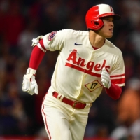 Angels designated hitter Shohei Ohtani runs the bases after hitting a two-run home run against the Mets in Anaheim, California, on Saturday. | KYODO