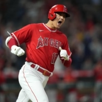 Angels designated hitter Shohei Ohtani celebrates after hitting his second home run of the night against the Royals in Anaheim, California, on Tuesday. | USA TODAY / VIA REUTERS
