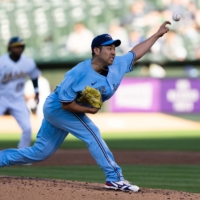 Yusei Kikuchi pitches against the A's in Oakland on Tuesday. | USA TODAY / VIA REUTERS