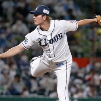 The Lions' Tatsuya Imai pitches against the Marines in Tokorozawa, Saitama Prefecture, on Thursday. | KYODO