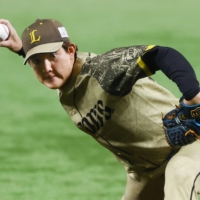Seibu's Kaito Yoza pitches against the Hawks in Fukuoka on Saturday. | KYODO