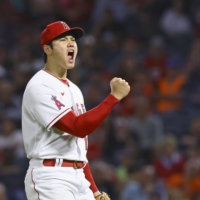 Shohei Ohtani reacts after ending the sixth inning with a strikeout against the Astros in Anaheim, California, on Wednesday. | KYODO