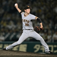 Giants starter Shosei Togo pitches against the Tigers in Nishinomiya, Hyogo Prefecture, on Tuesday. | KYODO