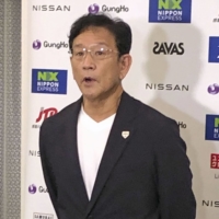 Samurai Japan manager Hideki Kuriyama speaks to the media after returning from the U.S. on Sunday night. | KYODO