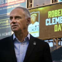 MLB commissioner Rob Manfred on the field before the start of a Roberto Clemente Day ceremony before a game between the New York Mets and the Pittsburgh Pirates at Citi Field, in Queens, New York, on Thursday. | USA TODAY / VIA REUTERS