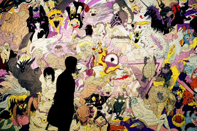 Un visiteur devant « Univers/Final Fantasy », de l’artiste japonais Yoshitaka Amano. A la Bundeskunsthalle, à Bonn, le 28 juillet 2011. 