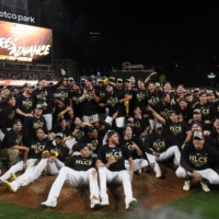 The San Diego Padres take a victory photo after defeating the Los Angeles Dodgers in Game 4 of the 2022 NLDS at Petco Park, in San Diego, California, on Saturday. | USA TODAY / VIA REUTERS