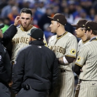 Padres starter Joe Musgrove is checked for illegal substances during the sixth inning of the NL wild-card game against the Mets in New York on Sunday. | USA TODAY / VIA REUTERS