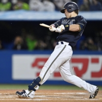 Orix's Torai Fushimi breaks his bat during the 12th inning in the Game 2 of the Japan Series at Jingu Stadium on Sunday. | KYODO